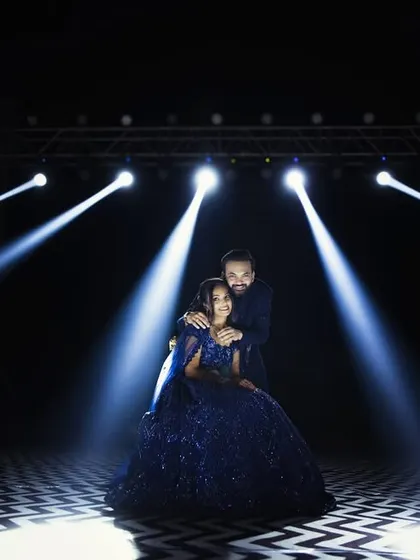 For couples who want a touch of Bollywood glamour, we can create a high-energy, cinematic scene. Using dramatic stage lighting, we can craft a pre-wedding photo that feels like your very own movie poster.