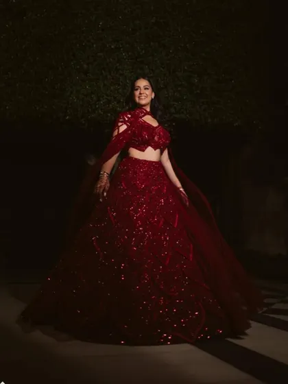 The crimson red lehenga in motion, a perfect blend of classic beauty and contemporary flair for an unforgettable special day.