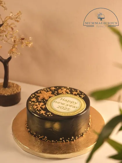 A mini version of our New Year's chocolate truffle cake. This 350gm cake is perfect for a smaller, more intimate celebration to welcome 2025.