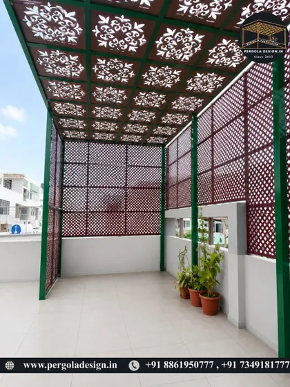 A different perspective of the rooftop pergola, showcasing the intricate lattice and floral patterns of the CNC-cut ceiling panels. This design provides beautiful filtered light and enhances the overall look of the space.