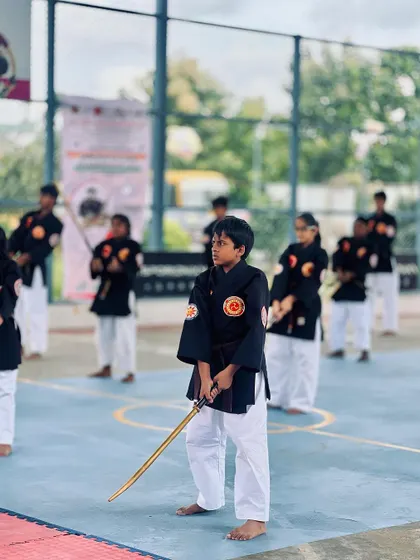 A young participant holds his practice sword with focus, embodying the spirit of the samurai.