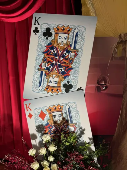 A close-up of the custom-designed "King of Clubs" and "King of Diamonds" props, which served as major statement pieces for the event.