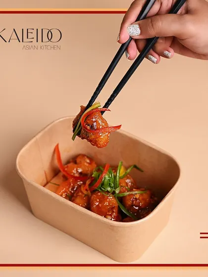 You can still have an exquisite Asian meal even if you're going veggie. This dish features crispy cauliflower tossed in a sweet and spicy sauce, a favorite on my vegetarian menu.