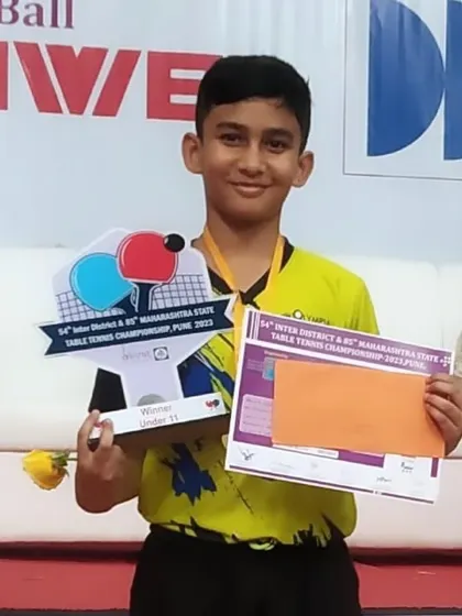 State champion Aakarshan Yadav, winner of the U-11 boys' event at the Maharashtra State Championship. His victory is a result of dedicated practice and our specialized youth training program.