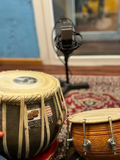 My tabla and dholak ready for a session. This highlights my primary instruments for studio work, showcasing my readiness to contribute to diverse musical styles.