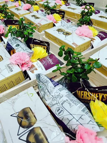 A detailed shot of the contents of our planter hamper, including snacks and chocolates.