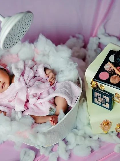 A duplicate of image 164, showing the full glamorous newborn spa setup.