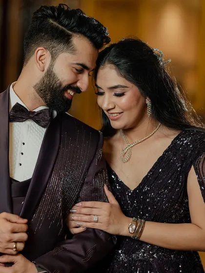 A classic, romantic portrait of the newly engaged couple, their smiles reflecting the joy of their commitment.