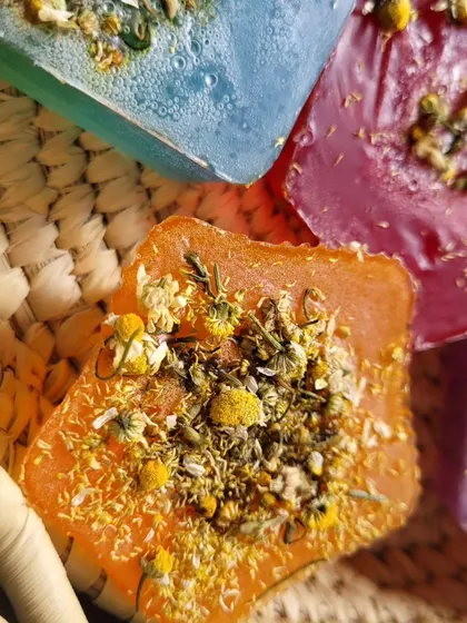 Another angle on the Chamomile soap, showing the texture and the generous amount of herbs in each bar.