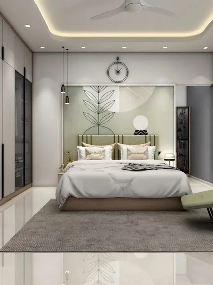 A spacious and elegant master bedroom with a full-wall wardrobe featuring glass doors. The design uses a calm, neutral color palette, a comfortable chaise lounge, and artistic wall decor to create a peaceful and luxurious sanctuary.