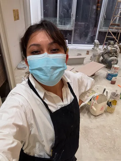 The reality of being on site: a mix of glitter, gold, dust, and a mask. It's not always glamorous, but it's always worth it.