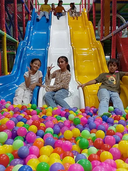 The joy of sliding into a sea of colorful balls is pure childhood magic. My multi-lane slides are a favorite in the adventure zone, perfect for friends to race down together and make a big splash in the ball pit.