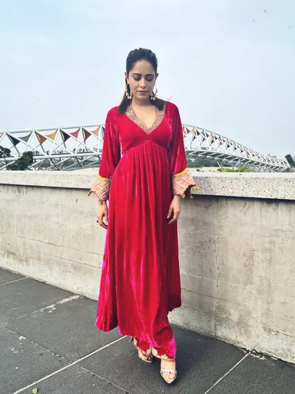 A final look at this stunning pink velvet suit, a perfect example of modern Indian festive wear.