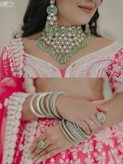 A detailed shot of the bride's statement jewelry and bangles. We believe in capturing every element that contributes to the bridal look.