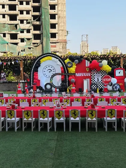 The perfect pit stop for little racers. This outdoor Ferrari party featured long tables with custom Ferrari-branded chair backs, creating a VIP experience for all the young guests.