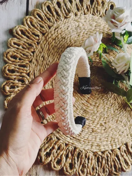 The same braided macrame hairband design in a classic off-white. This neutral color goes with everything and adds a touch of boho elegance.