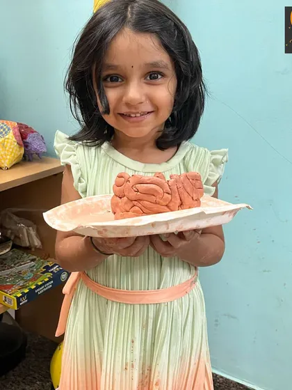 So proud of this little artist and her clay brain sculpture! Working with clay in three dimensions is a fantastic way to develop spatial awareness and fine motor skills.