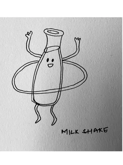 Just a happy little bottle of milk doing the hula hoop. This is a "Milk shake"!