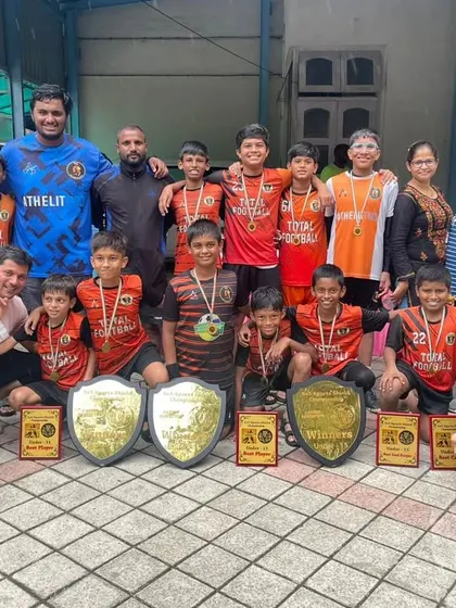 A group photo of our champion teams, coaches, and parents at the 5v5 Sports tournament.