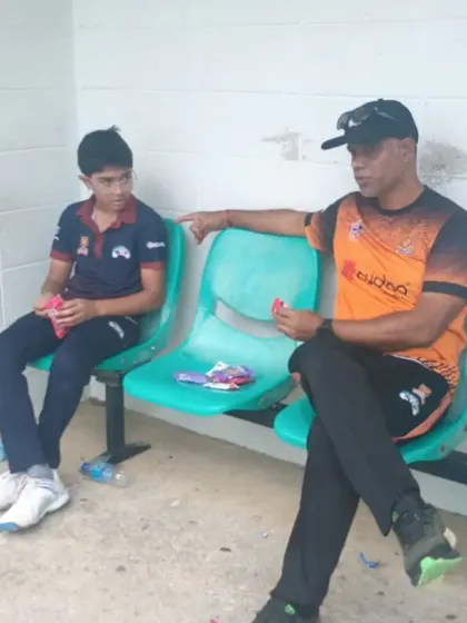 A glimpse from the CYCA tour to Trinidad, where our players trained at the Brian Lara School. Here, a coach provides one-on-one guidance to a young player.