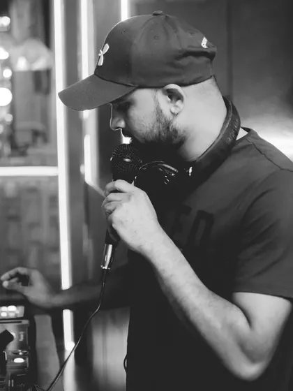A black and white shot from behind the console. It's all about focusing on the music and feeling the energy of the room before dropping the next track.