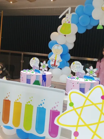 A closer look at the themed cakes and decorations for the science party.
