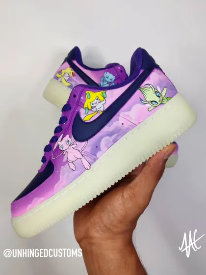 The other side of the mythical Pokémon custom, featuring Celebi. The glow-in-the-dark sole of the base shoe adds to the magical, otherworldly feel of this pair.