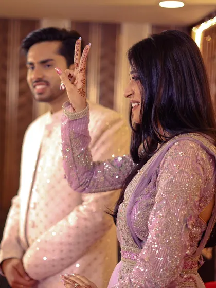 A fun, candid moment of the bride-to-be during her engagement ceremony.