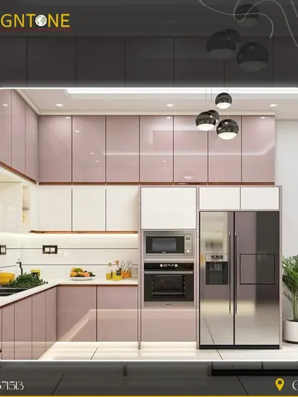 A beautiful kitchen design featuring two-tone cabinetry in glossy mauve and white. This setup includes integrated appliances and a side-by-side refrigerator, showcasing a modern and colorful approach to kitchen interiors.