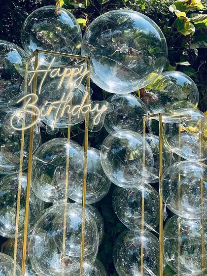 Our stunning bubble backdrop is perfect for adding a touch of modern elegance to any event. The clear bubbles create a unique and playful photo opportunity.