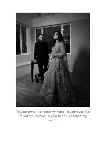 A classic black and white portrait with a heartfelt quote. The couple stands in a softly lit room, creating a timeless and romantic photograph.
