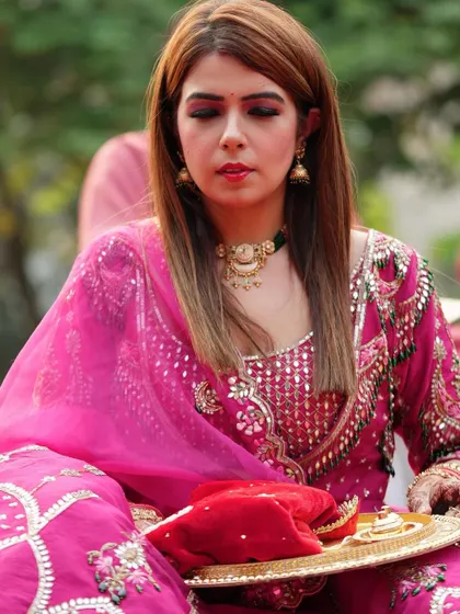 A close-up portrait of the client, looking beautiful for her Karwa Chauth celebration.