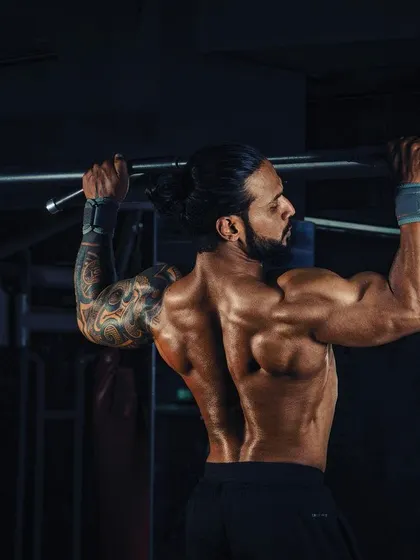 No more excuses. A strong, wide back is built with exercises like pull ups. This is a cornerstone of my strength training programs.