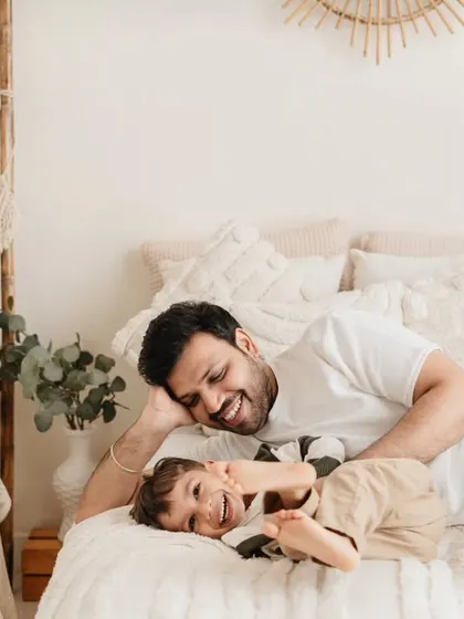 A candid moment of play between father and son. These relaxed, lifestyle shots truly capture the personality of your family.