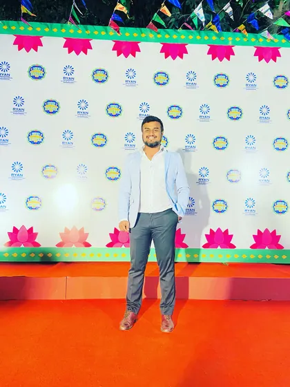 Posing on the red carpet at the Ryan Festival. I take pride in being a part of such well organized and grand school events.
