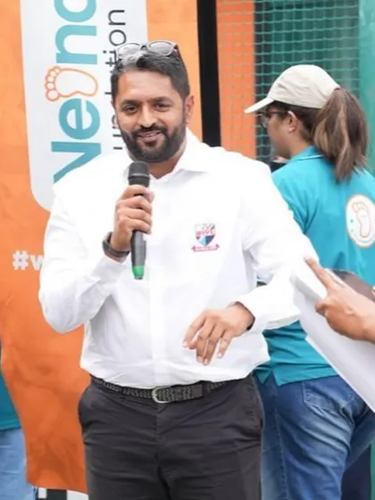 Mr. Adhip Bhandary speaking at the event, representing BYFL's commitment to community causes.