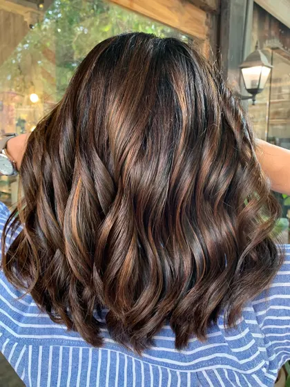 The back view of this sun-kissed makeover. The new cut and color are so fresh and modern. (No filter)