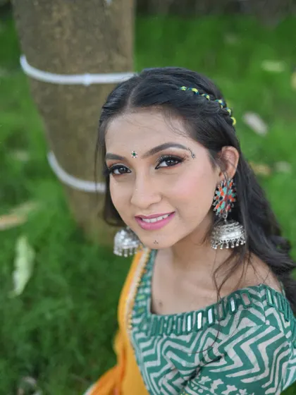 A close up portrait from my Garba lookbook. The bindi, the jhumkas, and the smile are all part of the festive character I bring to my performances.