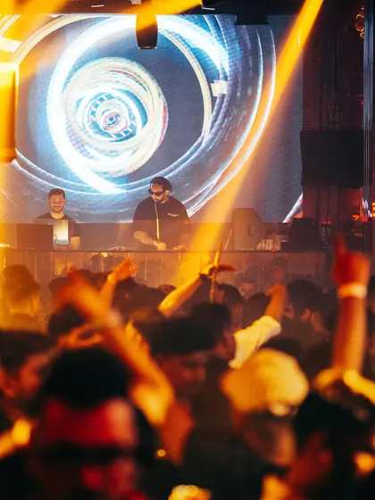 A view from the console as the crowd goes wild. The combination of great music, dynamic visuals, and an engaged audience is what I aim for at every event.