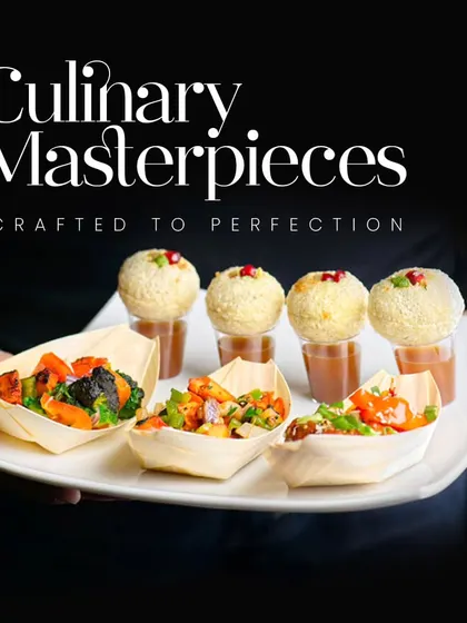 Culinary masterpieces crafted to perfection. This platter features two types of innovative appetizers: savory vegetable boats and pani puri shots, showcasing our creative presentation.