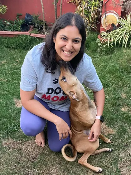 This is the result of patience and trust. Chai, who was once a very anxious puppy, now showing affection and confidence. It's a testament to her owner's commitment to the force-free training process.