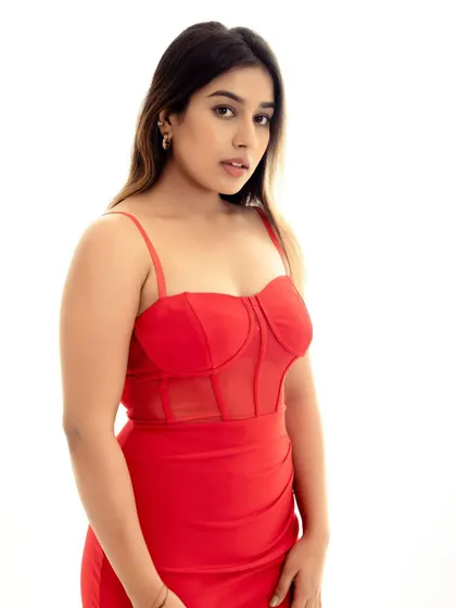 A classic portrait in the red dress, with a simple and direct gaze. It’s a clean, effective shot for any portfolio.