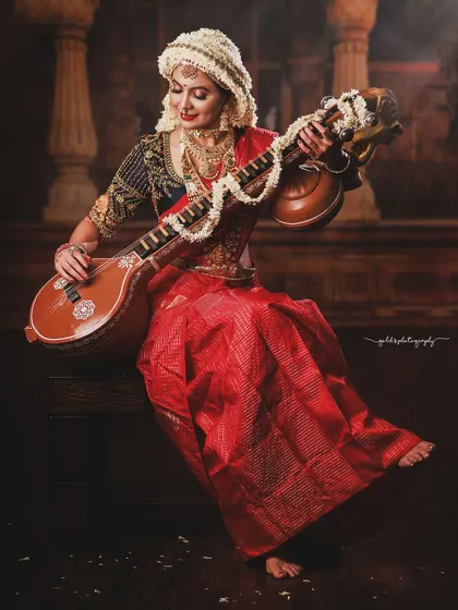 Portraying the classic Mangalore Sharada look, this image highlights the elaborate "Sharada Jalli" jasmine hairstyle. This is a specialized, traditional style that requires hours of preparation, and I capture it with reverence for the artistry involved.
