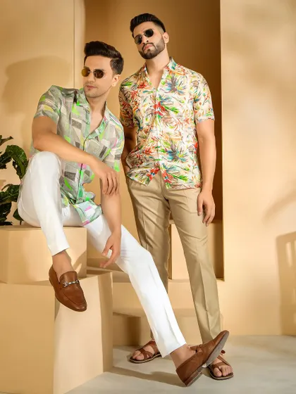 In this studio shoot for a men's fashion brand, the goal was to create a clean, commercial look that highlights the apparel. I directed the models in relaxed poses to convey a sense of effortless style, focusing on the details of the printed shirts and trousers.