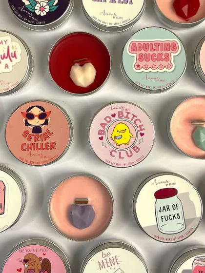 A fun and quirky bulk order of my sassy tin candles. With labels like "Adulting Sucks" and "Bad Bitch Club," this shows my ability to cater to modern, playful themes for corporate or personal gifting.