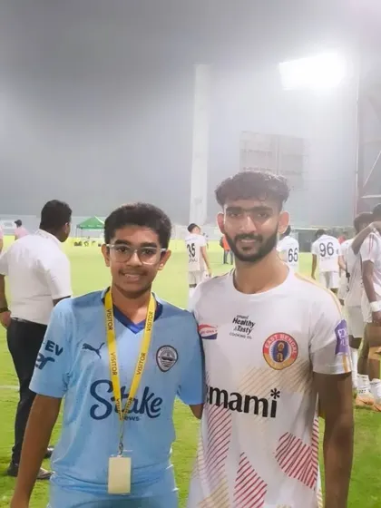 An aspiring young footballer from our academy meets a professional player, a moment of inspiration.