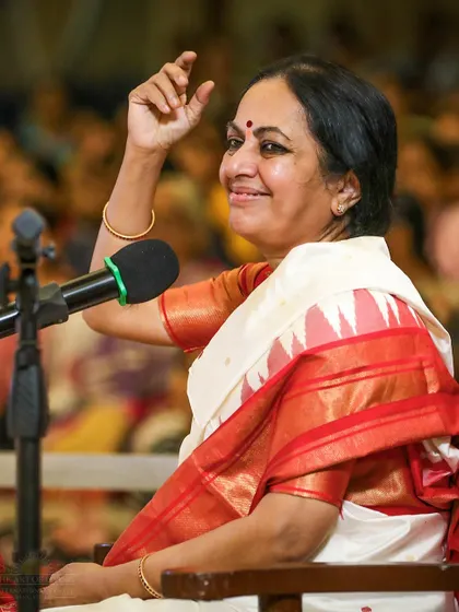 Bhanumathi Narasimhan shares a joyful moment during the VVMVP Foundation Day satsang. The evening was a celebration of the journey, the people, and the vision.