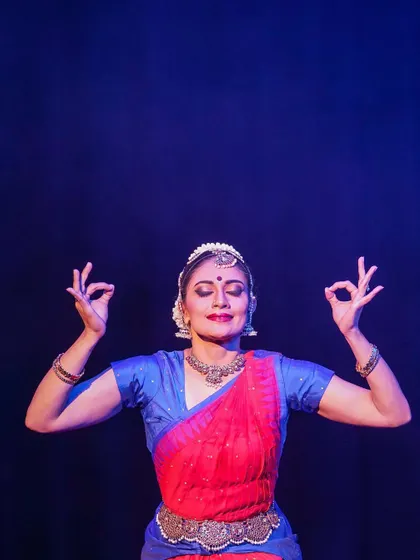 A moment of quiet contemplation during a performance in the UK. The stage is a sacred space, and finding these moments of inner peace amidst the energy of a performance is a practice in itself.