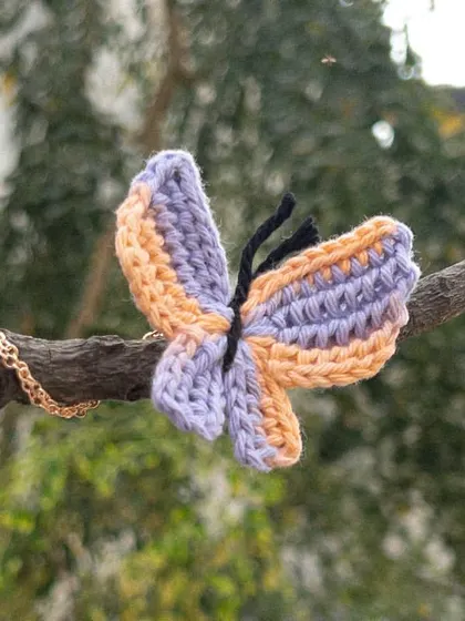 The 'Titli' necklace in a dreamy peach and lilac. This is such a soft and pretty color combination.