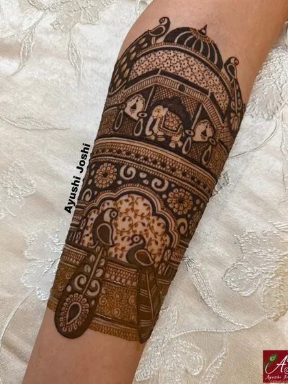 A close-up of the upper part of the arm design, focusing on the royal palace and elephant details.
